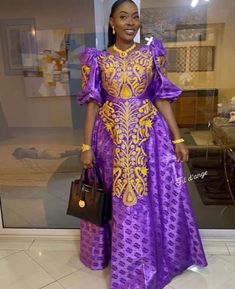 Description: This magnificent custom African dress is perfect for any occasion you want to look your best. Important Note: For broderie mix with bazin and garniture mix clothes only: Depending on the availability of the( fabric) / Garnitures (TRIMS) may be different than the one in the pictured. However, the dress will be sewn exactly in the style and colors shown. You can always request to see the fabrics or trims before we start by sending us a message along with your order. PROCESSING: We usu Traditional A-line Party Dress, Festive Brocade Formal Dress, Festive Formal Brocade Dress, Festive Brocade Dress For Formal Occasions, Formal Floor-length Brocade Dress, Formal Gold Brocade Dress, Fitted Embroidered Gold Dress, Traditional Purple Evening Dresses, Brocade Banquet Dress