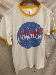 Country Deep Space Cowboy 70's ringer Unisex Tee Tri blend unisex T shirt 4.3 oz. 60% Cotton/40% Poly Vintage Space Tshirt, Vintage Tshirts 70s, Cowboy Fashion For Men, Space Tshirt, Kacey Musgraves, Space Cowboys, Vintage Space, Cowboy Style, Vintage Tshirts