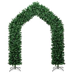 an arch made out of trees on top of each other