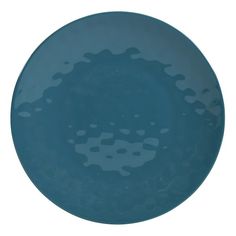 a blue plate with holes in the middle