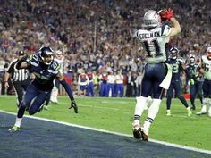 a football player jumping up into the air