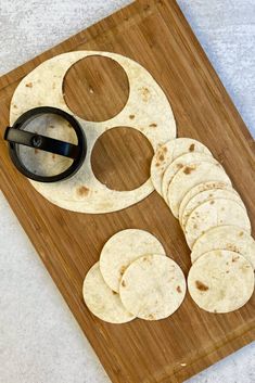 tortilla slices on a cutting board with a pair of scissors