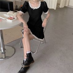 Description: An elegant black vintage gothic dress with white ruffles will be a great choice for a summer outfit, a versatile dress for both walks and stylish photo shoots on your Instagram. Material: Cotton Polyester S: Shoulder - 34cm/ Bust - 84cm/ Length - 79cm/ Sleeve - 26cm M: Shoulder - 35cm/ Bust - 86cm/ Length - 80cm/ Sleeve - 27cm L: Shoulder - 36cm/ Bust - 88cm/ Length - 81cm/ Sleeve - 28cm XL: Shoulder - 37cm/ Bust - 90cm/ Length - 82cm/ Sleeve - 29cm 2XL: Shoulder - 38cm/ Bust - 92cm Black Gothic Mini Dress With Lace Trim, Gothic Mini Dress With Ruffles And Short Sleeves, Fitted Black Vintage Dress With Lace Trim, Black Ruffled Mini Dress For Cosplay, Fitted Vintage Black Dress With Lace Trim, Black Vintage Dress For Spring Costume Party, Black Vintage Dress For Costume Party In Spring, Black Summer Cosplay Dress, Black Mini Dress With Lace Trim For Costume Party