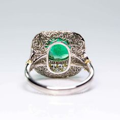 For Sale on 1stDibs - For sale is an Estate Platinum and 18K Yellow Gold Victorian Diamond & Emerald Flower Ring! Showcasing one round brilliant cut fine quality Emerald weighing Victorian Yellow Gold Emerald And Diamond Ring, Victorian Emerald Jewelry In Yellow Gold, Victorian Yellow Gold Emerald Ring, Antique Yellow Gold Emerald Cabochon Ring, Luxury Victorian Yellow Gold Emerald Ring, Flower Ring, Round Brilliant, Fashion Rings, Emerald