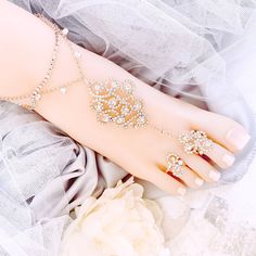 Rose Gold Barefoot Sandals for Wedding, Double Layered Rhinestone Foot Jewelry, Footless Beach Barefoot Sandals, Bridal Barefoot Shoes This stunning Rose Gold plated rhinestone footless sandal is the perfect accessory for a beach or garden wedding. This sandal is made with a rhinestone applique. It is very comfortable and adjustable. One size fits most . This amazing pair of Rhinestone barefoot sandals are perfect for Your destination wedding. Model Size is US 7 Sandals are made with clear Crystals with Rose Gold plating. This listing is for 1 PAIR of barefoot sandals. Sandals For Wedding, Sandals Bridal, Rhinestone Appliques, Womens Wedding Shoes, Crystal Rose, Barefoot Shoes, Foot Jewelry, Garden Wedding, Wedding Shoes