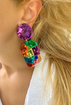 A handmade pair of clip on earrings that is made from different pieces of plexiglass in rainbow colors that is connected by hand with every detail. Find them only at Christina Christi Store. My Earrings Collection: https://etsy.me/2UiXmKR MATERIALS - Plexiglass Parts. - Metal Parts. - Clip On Earrings. DIMENSIONS - Total length of Clip On Earrings: 8 cm (3,14'') - Total length of Clip On Earrings: 3.5 cm (1.37'') PROTECTION - Protect them from water, parfumes, hair and body lotion to keep them b Trendy Multicolor Single Earring, Trendy Multicolor Dangle Earrings, Trendy Colorful Earrings, Multicolor Pierced Earrings For Party, Multicolor Party Earrings, Multicolor Dangle Earrings For Party, Multicolor Single Earring For Party, Funky Drop Earrings For Party, Unique Drop Clip-on Earrings For Party