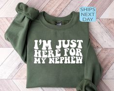 Im Just Here For My Nephew Sweatshirt, Gift For Aunt Hoodie, Cute Aunt Gift From Nephew, New Future Aunt Apparel, Funny Aunt Life Clothing ⭐ HOW TO ORDER ⭐ 1️⃣ Please check all the photos in the listing. 2️⃣ Choose your shirt size and color. (Please check listing photos for these) 3️⃣ In the personalization box, please enter your Text, Text Color, Text Style. 4️⃣ Click "Add to Cart". You can go back to the listing and follow the same steps to add more products. 5️⃣ Click "Proceed to Checkout". 6 Aunt Gifts From Nephew, Auntie Sweatshirt Ideas, Aunt And Uncle Shirts, Aunt Christmas Gifts Ideas, Nephew Shirts, Auntie Life, Auntie Era, Aunt Sweatshirt, Gift For Aunt