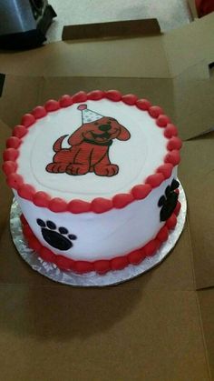 a birthday cake decorated with an image of a dog