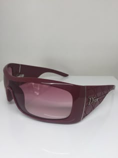 New Dior Cannage 2 Sunglasses Shield Wraparound C. ATWAD Burgundy Red with Silver Made in Italy New Authentic Dior Cannage 2 Shield Wraparound Sunglasses Model: CD Cannage 2 Color: C. ATWAD, Burgundy Red with Silver Total Width: 145 mm (Approximately 5.50 inches) Lenses: Light Rose Gradient Shield Lens Size: One Piece Shield Temple Length: 115 mm Ships with Case Made in Italy All Sales Final  No Returns Luxury Red Sunglasses, Luxury Red Tinted Sunglasses, Burgundy Sunglasses, Dior Shield Sunglasses, Burgundy Accessories, Dior Sunglasses Y2k, Sunglasses Christian Dior, Wraparound Sunglasses, Y2k Glasses