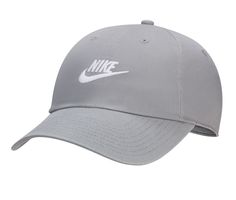 65% polyester and 35% cotton fabric upper, Adjustable back strap for a secure fit, Sweatband for added comfort, Curved bill cap design,2 1/2 inch bill, Nike branding details, One size fits most | Nike US Futura Washed Baseball Cap in Grey/White Size M/L Nike Sporty Hat With Curved Visor, Casual Nike Breathable Hat, Sporty Nike Hat With Curved Visor, Nike Sporty Baseball Cap For Sports, Nike Sporty Baseball Cap For Streetwear, Nike Sporty Hats For Streetwear, Nike Sporty Breathable Hats, Nike Sporty Streetwear Hats, Trendy Sports Hat In Solid Color