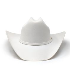 The Pageant from Resistol is a great option to add to your hat collection. Unique for its white wool, expect many compliments from passersby. It features the classic cattleman crown, 4'' brim, and a beautiful 3-piece buckle hatband. This is a good looking have for both cowboys and cowgirls. It is a hat for all seasons and all occasions. 4x Wool Crown 4 5/8" Brim 4" 3-piece buckle set hatband Satin lining Black leather sweatband Made in USA Water repellent wool STY RWPGNT-7540 Ranch Hats, White Cowgirl Hat, White Cowboy Hat, Looks Country, Chapeau Cowboy, Western Life, Cowboy Up, Rodeo Cowboy, Taylor Swift Outfits