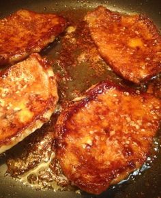 some food is cooking in a pan on the stove top and it looks like they have been cooked