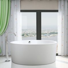 a large white bath tub sitting in front of a window next to a green curtain