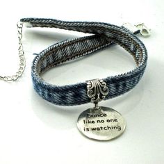 there is a bracelet with a charm on it that says dance like no one is watching