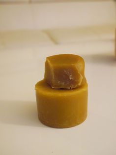 a piece of wax sitting on top of a counter