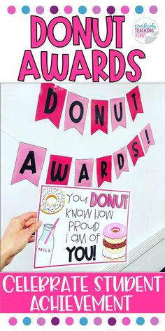 the donut award is displayed on a bulletin board with pink and blue polka dots