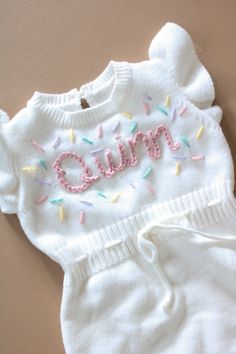 Beautiful birthday hand embroidered romper.  Celebrate your baby's big day with the cutest and happy sprinkles and confetti romper Custom order welcome Sweet White Bubble Romper For First Birthday, White Cute Bubble Romper For First Birthday, Cute White Bubble Romper For First Birthday, Playful White Bubble Romper For First Birthday, Sweet White Bubble Romper For Party, Embroidered Romper, Confetti Sprinkles, Beautiful Birthday, Baby Accessories