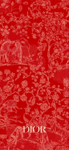 a red book cover with an elephant and flowers on it