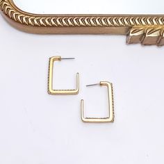 These Gold Tone Rectangle Earrings are truly special pieces of jewelry. Made with a sophisticated gold tone metal and embellished with a beautiful clear crystal inlay, these earrings are sure to make you shine bright. These hoops are about 1.25 inches long and 1 inch wide SKU: #0516-2338 Rectangle Hoop Earrings, Trendy Boutique Clothing, Giddy Up Glamour, Rectangle Earrings, Trendy Boutique, Shine Bright, Gold Tone Metal, Clear Crystal, Boutique Clothing