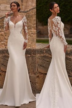 a woman in a white wedding dress standing next to a stone wall