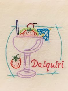 a drawing of a cocktail glass with strawberries and a garnish on it