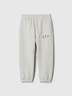 Soft cotton-blend joggers.  Elasticized waist.  Front slant pockets.  Gap arch logo at thigh.  This product was made in a factory that invests in gender equality and women’s empowerment.  Through RISE Reimagining Industry to Support Equality) and Gap Inc. ’s program P. A. C. E.  Personal Advancement & Career Enhancement), we support people who make our clothes to build the skills, knowledge, confidence, and resilience needed to advance in work and life.  Learn more here.  Easy pull-on waist.  Ea Joggers Grey, Arch Logo, Gap Logo, Vintage Toddler, Brand Collaboration, Support People, Gender Equality, Vintage Soft, American Brand