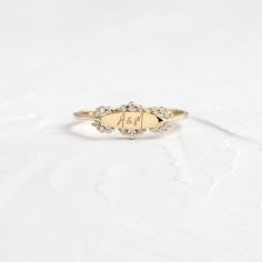 Filigree Signet Ring | Melanie Casey Fine Jewelry Elegant Personalized Diamond Rings, Personalized Dainty Diamond Ring For Wedding, Dainty Personalized Diamond Promise Ring, Dainty Personalized Diamond Ring For Anniversary, Personalized Diamond Stackable Rings For Wedding, Personalized Diamond Stackable Wedding Rings, Elegant 14k White Gold Signet Promise Ring, Adjustable 14k Gold Signet Wedding Ring, Personalized White Gold Diamond Ring