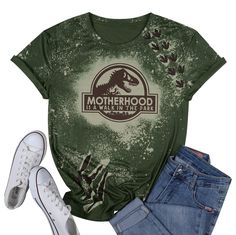 PRICES MAY VARY. MATERIAL: This mama funny shirt is made of 60% Polyester 35% Cotton 5% Spandex, soft and comfortable. Recommend wash in cold water in order to protect the color and pattern. SUITABLE ACCASIONS: Mamasaurus dinosaur t-shirt,dinosaur mom shirt,short sleeve, o neck, light weight and comfy to wear in summer, fall, spring, winter women short sleeve tops. Super soft and comfortable to wear. EASILY PAIR WITH: This cute dinosaur mom shirt is ideal to pair with jeans, shorts or trousers. Dinosaur T Shirt, Dinosaur Print Graphic Tee In Relaxed Fit, Green T Shirts, Graphic Tee With Dinosaur Print And Crew Neck, Mom A Saurus Shirt, Mama Dinosaur Shirt, Dinosaur Clothes, Dinosaur Print Crew Neck Graphic Tee, Mom Presents