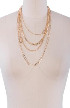 Mixed chains style a four-layer necklace that's perfect for a chic look. Cloth Store, Gold Link Chain, Store Jewelry, Layer Necklace, Household Chores, Gold Necklace Layered, Chic Look, Gold Accessories, Multi Strand Necklace