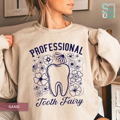 Professional Tooth Fairy SweatShirt For Women Dentist Gift Dental Hygienist Funny Dentistry Sweatshirt Dental Hygiene, Orthodontist, Dental Office, Dental Assistant, Dentist Gift, Hygienist Sweatshirt, Funny Dental Shirt, Tooth Fairy, Dentist Sweatshirt, Dental Hygienist, Dental School Shirt, Future Dentist Shirt, Hygienist Graduation, Welcome to my store. Do you want a personalized gift? 😊 It's a custom and unique gift for a sister, gift for brother, gift for a girlfriend, gift for boyfriend, Dentist Gift Ideas, Funny Dental Shirts, Dentist Aesthetic, Dental Decor, Dental Hygienist Humor, Dental Aesthetic, Dental Hygienist Graduation, Dental Graduation, Future Dentist