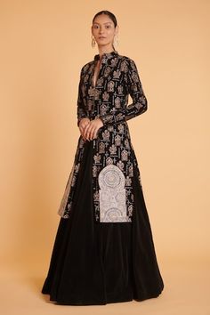 Black full sleeve sherwani with metallic thread, crystal window patchwork embroidery. Paired with velvet skirt. - Aza Fashions Long Sleeve Sherwani With Mirror Work For Navratri, Navratri Long Sleeve Sherwani With Mirror Work, Festival Long Sleeve Sharara With Sheer Dupatta, Festive Traditional Wear With Sheer Dupatta And Long Sleeves, Long Sleeve Sets With Sheer Dupatta For Navratri, Long Sleeve Kurta For Navratri Reception, Long Sleeve Choli With Sheer Dupatta For Navratri, Black Long Sleeve Anarkali Set With Mirror Work, Long Sleeve Bollywood Sharara For Transitional Season