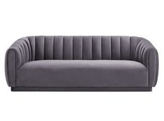 a gray velvet couch on a white background