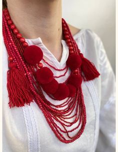 Necklace with Tassels and Beads: a unique designer approach to jewelry creation. Woolen and wooden beads, when combined, create the effect of forest warmth and natural coziness. The tassels at the ends have a delicate appearance and allow for adjusting the length of the necklace. This authentic accessory will undoubtedly become your favorite addition to both casual and festive outfits. The necklace is crafted from high-quality materials and features a sturdy construction, ensuring its durability Festival Beaded Necklaces With Tassels And Round Beads, Gift Beaded Necklaces With Wooden Beads, Traditional Long Beaded Necklaces With Wooden Beads, Traditional Long Beaded Necklace With Wooden Beads, Long Beaded Necklace With Tassels As Gift, Traditional Wooden Beaded Necklaces For Festive Occasions, Traditional Festive Beaded Necklace With Wooden Beads, Unique Beaded Necklaces With Wooden Beads For Festivals, Long Wooden Beaded Necklace For Gift