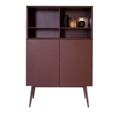 a brown bookcase with two shelves and some items on top of it in front of a white background