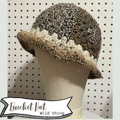 Handcrafted and truly one of a kind, this trendy speckled brown granny square bucket hat adds a touch of whimsy and warmth to any outfit. Perfect for those who love unique, handmade accessories! Made and ready to ship! Only 1 so get it before it's gone. Material is stretchy Fits head sizes - 19-22" Laid flat dimensions- 13" wide x 8" height Non-Return Policy: Thank you for choosing my handmade item! I take great pride in crafting each piece with care and attention to detail. As a small business, I appreciate your support and understanding of my store policies. Due to the unique nature of handmade items, I regret to inform you that I  am unable to accept returns or exchanges. In the rare event that your item(s) arrive(s) damaged or defective, please notify me within 5 days of receiving your Handmade Beige Hat For Fall, Country Style Brown Bucket Hat, Brown Crochet Short Brim Hat, Brown Bucket Hat For Fall, One Size Fits Most, Brown Crochet Hat With Short Brim, Vintage Handmade Beige Crochet Hat, Handmade Beige Yarn Bucket Hat, Adjustable Brown Crochet Hat With Short Brim, Brown Bohemian Bucket Hat With Short Brim