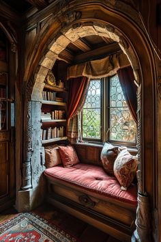 a window seat in the corner of a room with bookshelves on either side