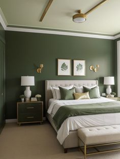 a bedroom with green walls and white bedding