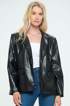 Crafted from soft faux leather and featuring a relaxed fit, this medium-weight blazer jacket gives you the edginess you crave. Product Details Material: 100% Polyester. Fit: True to size. Structured fit. Body length: 27" from shoulder to hem (size Small). Fabric: Faux leather with satin lining. Features: Single breasted stacked buttons, front pockets, shoulder pads, satin lining. Model: 5'9" / Wearing a size Small. Shipping & Returns Free Shipping on U.S. orders +$100. We want you to be 100% sat Sleek Faux Leather Blazer With Notch Lapel, Sleek Leather Jacket For Spring Business Casual, Sleek Leather Jacket For Business Casual Spring, Modern Spring Blazer For Night Out, Modern Blazer For Night Out In Spring, Spring Business Faux Leather Blazer, Classic Faux Leather Blazer For Night Out, Sleek Fall Blazer For Night Out, Sleek Blazer For Night Out In Fall