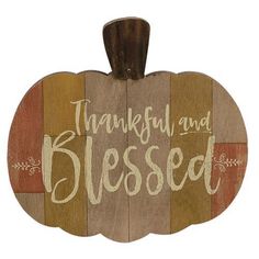 a wooden sign that says, grateful and blessed