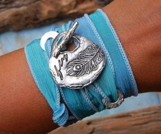 Best Selling Etsy Jewelry, Best Selling Bracelet, Magazine Featured Best Seller, HappyGoLicky Jewelr Music Festival Accessories, Silver Wrap Bracelet, Silk Wrap Bracelets, Wrap Armband, Peacock Jewelry, Feather Fashion, Hand Dyed Silk Ribbon, Mode Hippie, Feather Bracelet