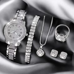 Elevate your style with this stunning Set of 6pcs Women's Luxury Roman Design Quartz Watch and Jewelry Set, perfect for the fashionable woman in 2024. This exquisite set includes a luxurious Roman numeral quartz wristwatch, along with a matching jewelry collection featuring a bracelet, necklace, earrings, and a ring. Designed for both casual and special occasions, the watch offers precise quartz movement and elegant design, while the jewelry pieces add a touch of sophistication. Whether for yourself or as a thoughtful gift, this set is perfect for birthdays, anniversaries, or any celebration. Stay ahead of fashion trends with this all-in-one accessory set. Set of 6 pieces: wristwatch, bracelet, necklace, earrings, and ring Roman numeral quartz wristwatch with luxury design Matching jewelry Roman Design, Watch And Jewelry, Womens Jewelry Trends, Watch Jewelry, Girly Accessories, Matching Jewelry, Roman Numeral, Wedding Jewelry Sets, Watches Jewelry