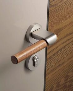 the door handle is made out of metal and wood