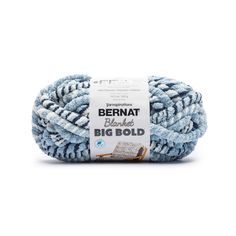 bernat big bold yarn ball in blue and white with the words bernat on it