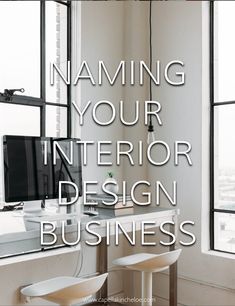 a computer desk sitting in front of a window with the words naming your interior design business