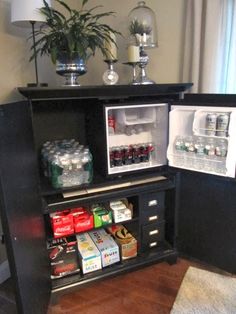 an open refrigerator in the corner of a room