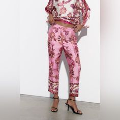 Brand New With Tags. Oversized Fit. Size Small Chic Floral Print Pants For Day Out, Pink Floral Print Pants For Day Out, Chic Spring Tapered Leg Pants, Elegant Floral Print Pants, Chic Tapered Leg Spring Pants, Trendy Ankle-length Pants For Spring, Trendy Ankle-length Spring Pants, Elegant Straight Pants With Floral Print, Chic Tapered Leg Pants For Spring