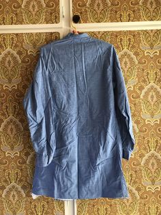 This is a shirt / tunic from Finnish company Marimekko. The fabric is very similar to nurse dresses from the same time. Blue with crispy structure. Nice details. 100% cotton. Size 36, 8, fits X Small - Small. It is from the late 1960s or 1970s. Very good condition, just needs some ironing. Don't hesitate to ask for more details. ♪♫♬ Long Sleeve Linen Kurta For Work, Traditional Long Sleeve Shirt For Daywear, Cotton Kurta For Work With Long Sleeves, Cotton Tunic With Buttons For Daywear, Blue Long Sleeve Kurta For Workwear, Blue Long Sleeve Workwear Kurta, Light Blue Cotton Kurta With Long Sleeves, Vintage Cotton Tunic Top, Light Blue Long Sleeve Cotton Kurta