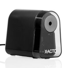 a black and white photo of an xacto printer