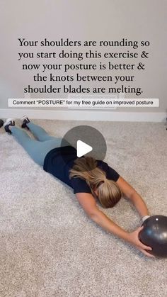 a woman is laying on the floor with her back to the wall while holding an exercise ball