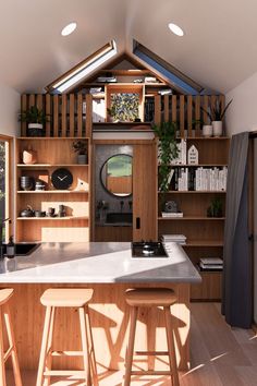 a kitchen with wooden cabinets and stools